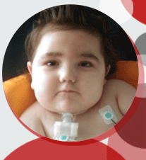 Tate with trach and monitor